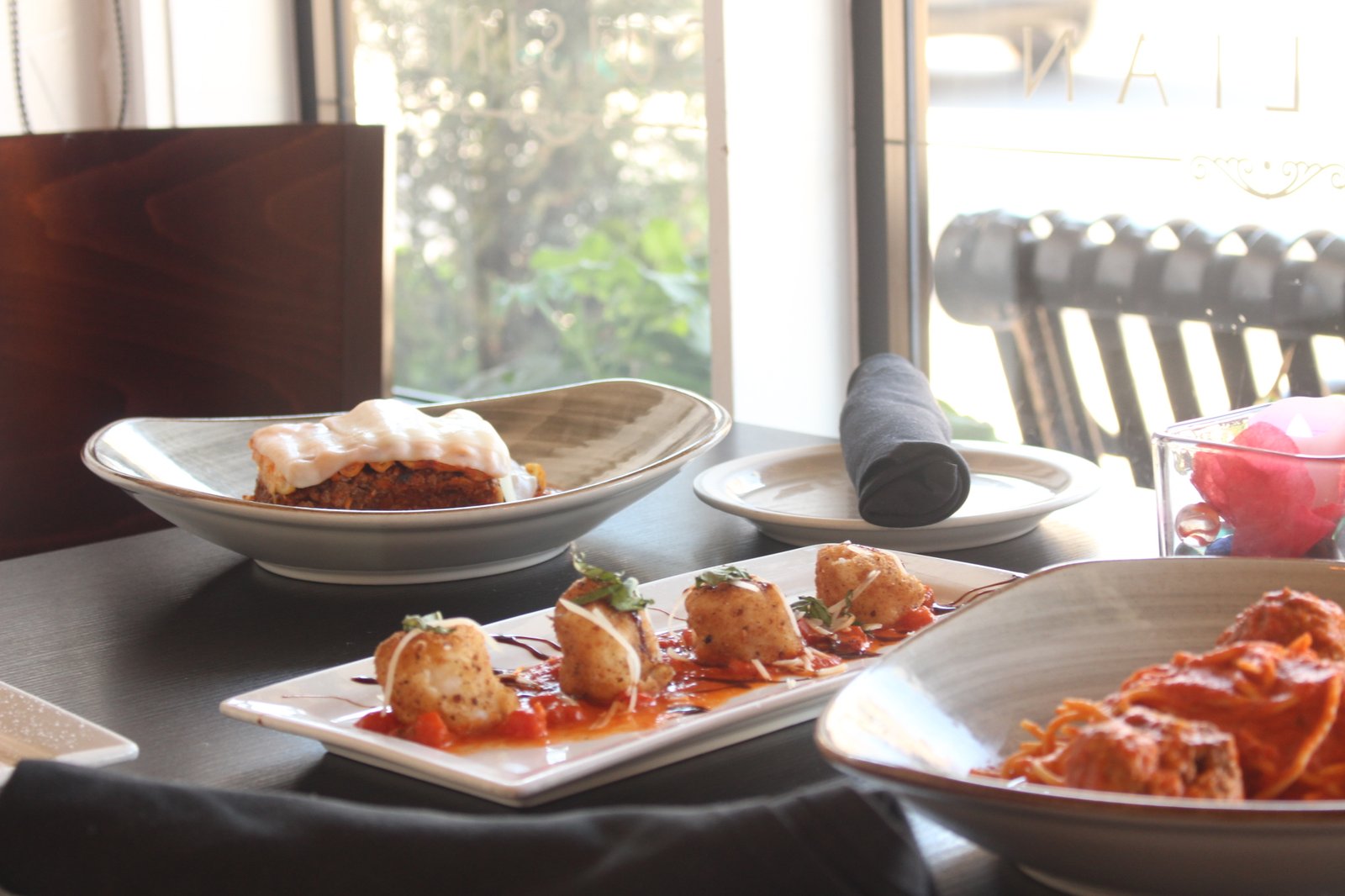 A spread of Italian dishes at Gina's